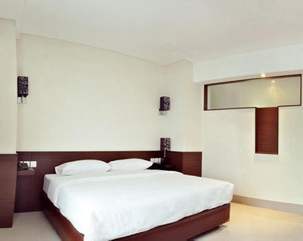 Bamboo Inn Hotel & Cafe Джакарта Стая снимка