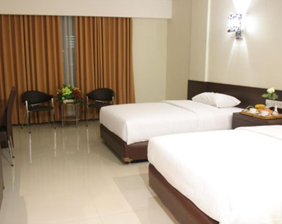 Bamboo Inn Hotel & Cafe Джакарта Стая снимка